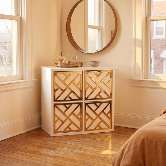 IKEA Kallax Criss Cross overlay in gold mirror beside a bedroom vanity — The Upscale Collection