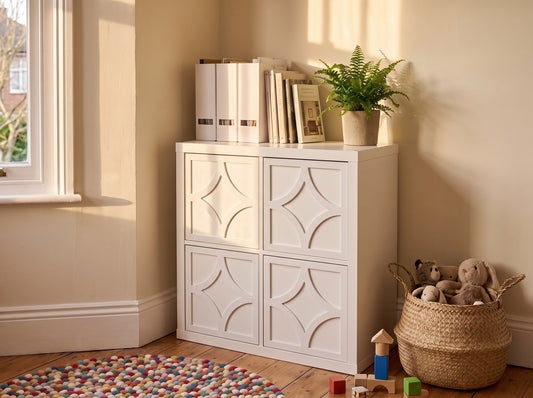 IKEA Kallax Diamond overlay in white on solid cube doors in a playroom — The Upscale Collection