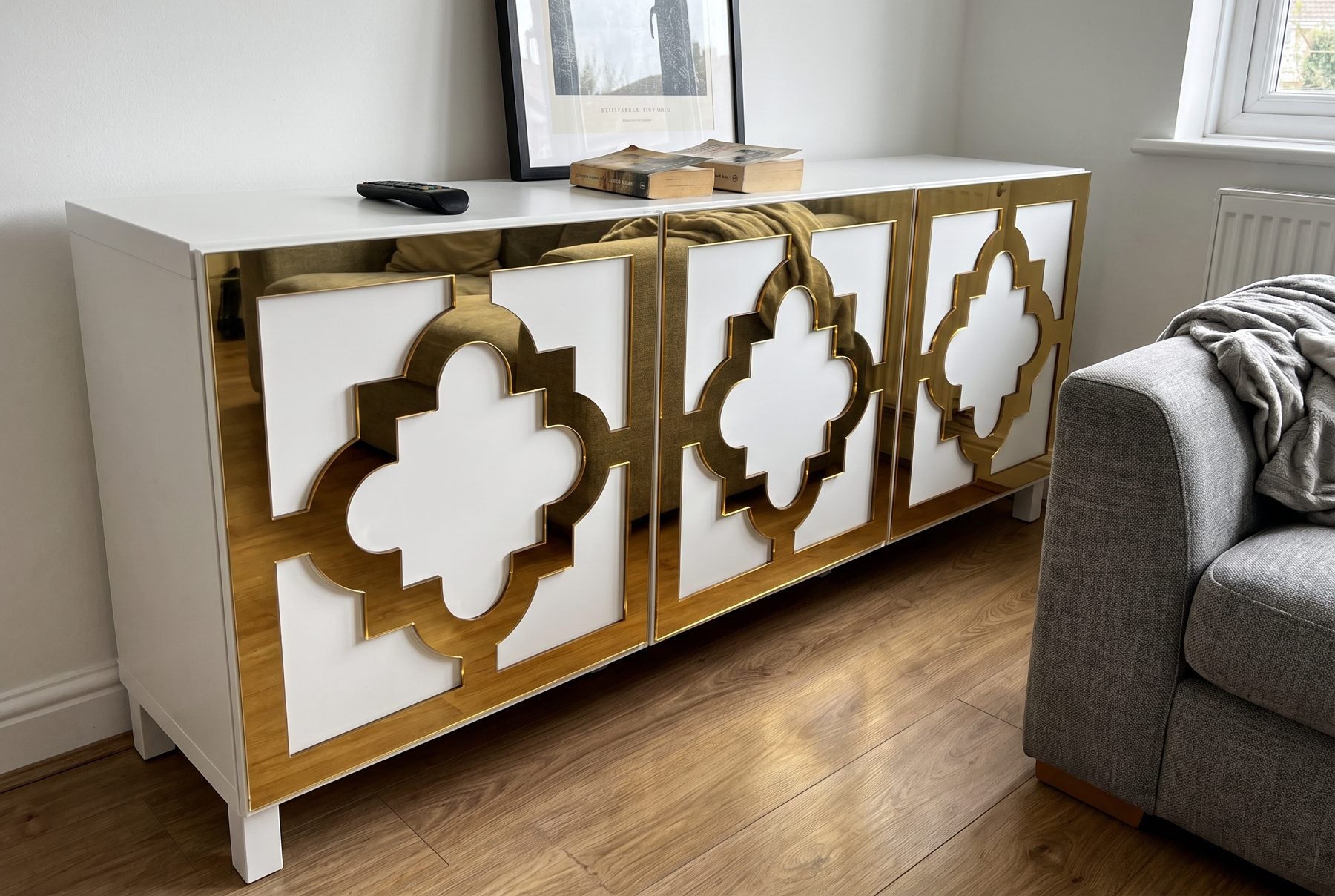 IKEA Besta sideboard transformed with gold mirror arabesque acrylic overlays in a UK living room