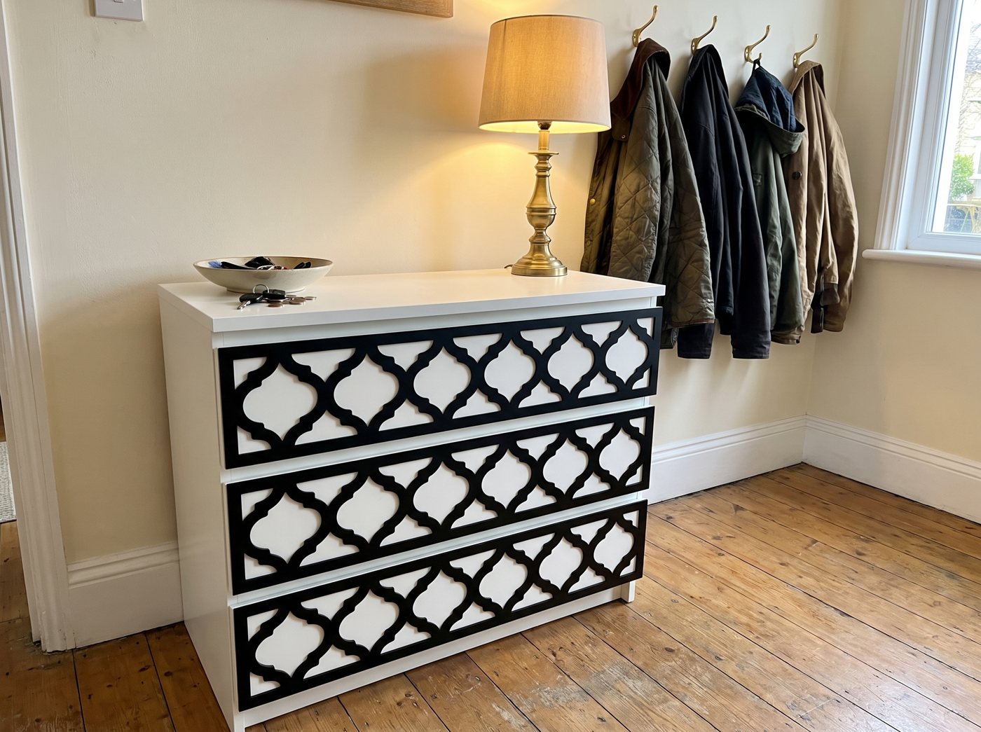 Black acrylic overlay shown on IKEA furniture